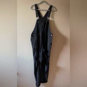 Black ripped overall pants